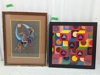 Both framed artworks side by side showing overall appearance
