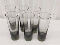 Six tinted highball glasses grouped, showing overall set