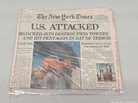 Front of sealed newspaper showing headline and photo