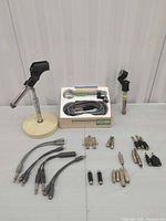 Overview of microphone, stand, cables and adapters laid out