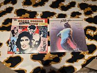 Front covers of both soundtrack LPs