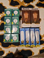 All 14 boxed Bulbrite bulbs arranged together