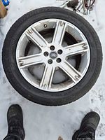 Full view of one tire and rim assembly