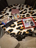 Three storage boxes on table showing lot contents