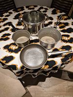 Full view of all cookware pieces on table