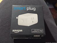 Front of box showing Amazon Smart Plug image and Alexa compatibility