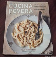 Front cover showing title, dish photo, author