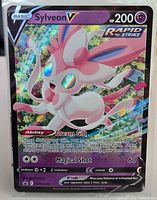Front of Sylveon V card in sleeve