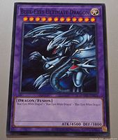 Front of Blue-Eyes Ultimate Dragon card showing artwork, set code SDWD-EN034, ATK/DEF values