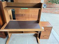 Full view of desk with hutch and adjoining two-drawer filing cabinet