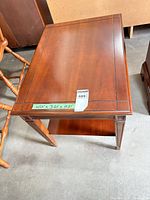 Top view of rectangular cherry-mahogany end table