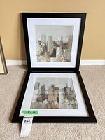 front view showing both framed prints