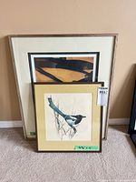 Both framed prints standing together for scale and frame style