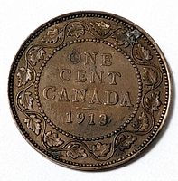 Reverse showing ONE CENT CANADA 1913 within maple leaf wreath