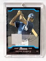 Front of Bowman Estee Harris jersey card in screw-down case
