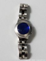 Full view of Fossil F2 wristwatch with metal band