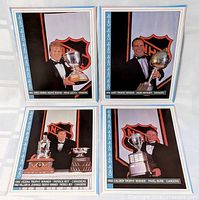 All four oversized cards laid out for identification