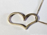 Open heart pendant on chain