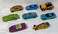 Group shot of all eight die-cast toy cars