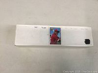 White cardboard box labeled '89 Bowman Baseball Cards containing trading cards.