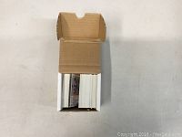 Box containing numerous 1993 Classic Hockey Draft Picks trading cards viewed from above.