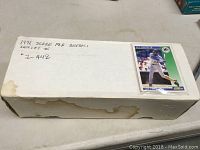 White cardboard box labeled '1992 Score MLB Baseball Series 1' with a single baseball card taped to the top right corner of the lid.