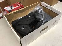 Liquid Force Alpha wakeboard bindings in original box, black and grey color, size 5-8. Box partially open showing pair of boots with laces and padded ankle support.