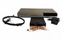 Front angled view of control unit with accessories laid out