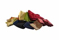 Group shot of all assorted linens in various colors and patterns