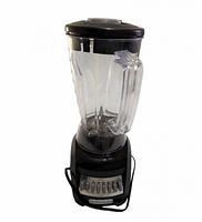 Blender fully assembled showing base, jar and lid