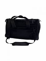 Full view of black Wild One pet carrier showing handles and shoulder strap