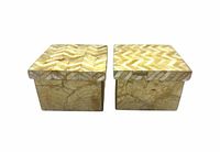 Two capiz shell boxes with lids view from top