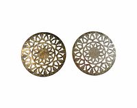 Top view showing both matching silverplate openwork trivets