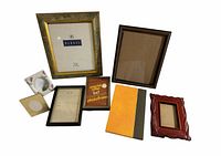 All eight picture frames grouped to show variety of sizes, materials and finishes