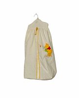 Front view of diaper stacker showing Pooh graphic and rickrack trim