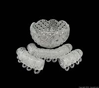 Punch bowl with cups arranged in arcs