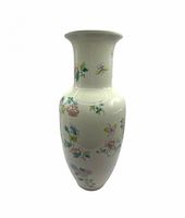 Full view of tall porcelain vase showing floral decoration