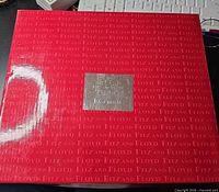 Front of red Fitz and Floyd Essentials box