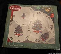 Front of original box showing plate and mug graphics