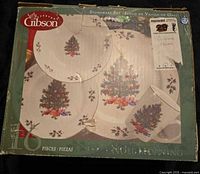 Front of box showing Noel Morning dinnerware images and branding