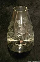 Full view of clear crystal vase with etched floral pattern