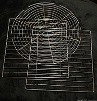 Group shot of three cooling racks: one round, two square