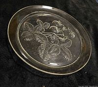 Single plate showing embossed strawberry pattern