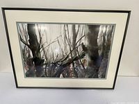 Framed watercolor forest scene, double matted, black frame