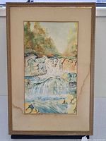 Frontal view of framed watercolour showing artwork, frame, mat and water stain