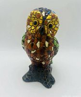 Front view of multicolored mosaic owl figurine