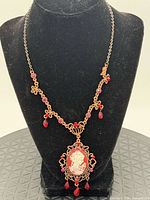 Full necklace on display bust showing overall design