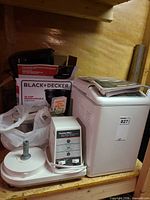 Overall lot showing both appliances, box, and accessories