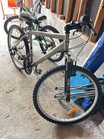 Full side view of silver CCM Nitro XT mountain bike with front wheel turned