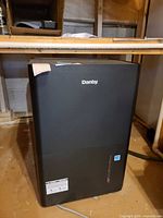Front view of Danby black dehumidifier